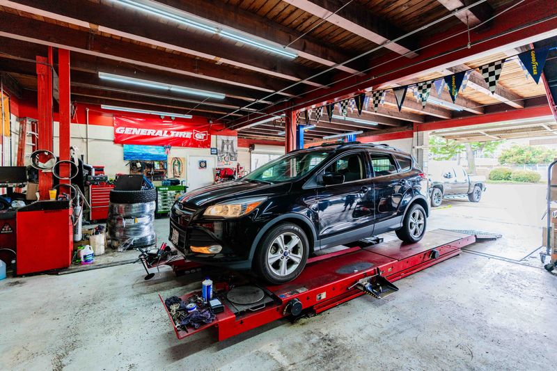 Image of cars undergoing car repairs at Pitt Stop Auto