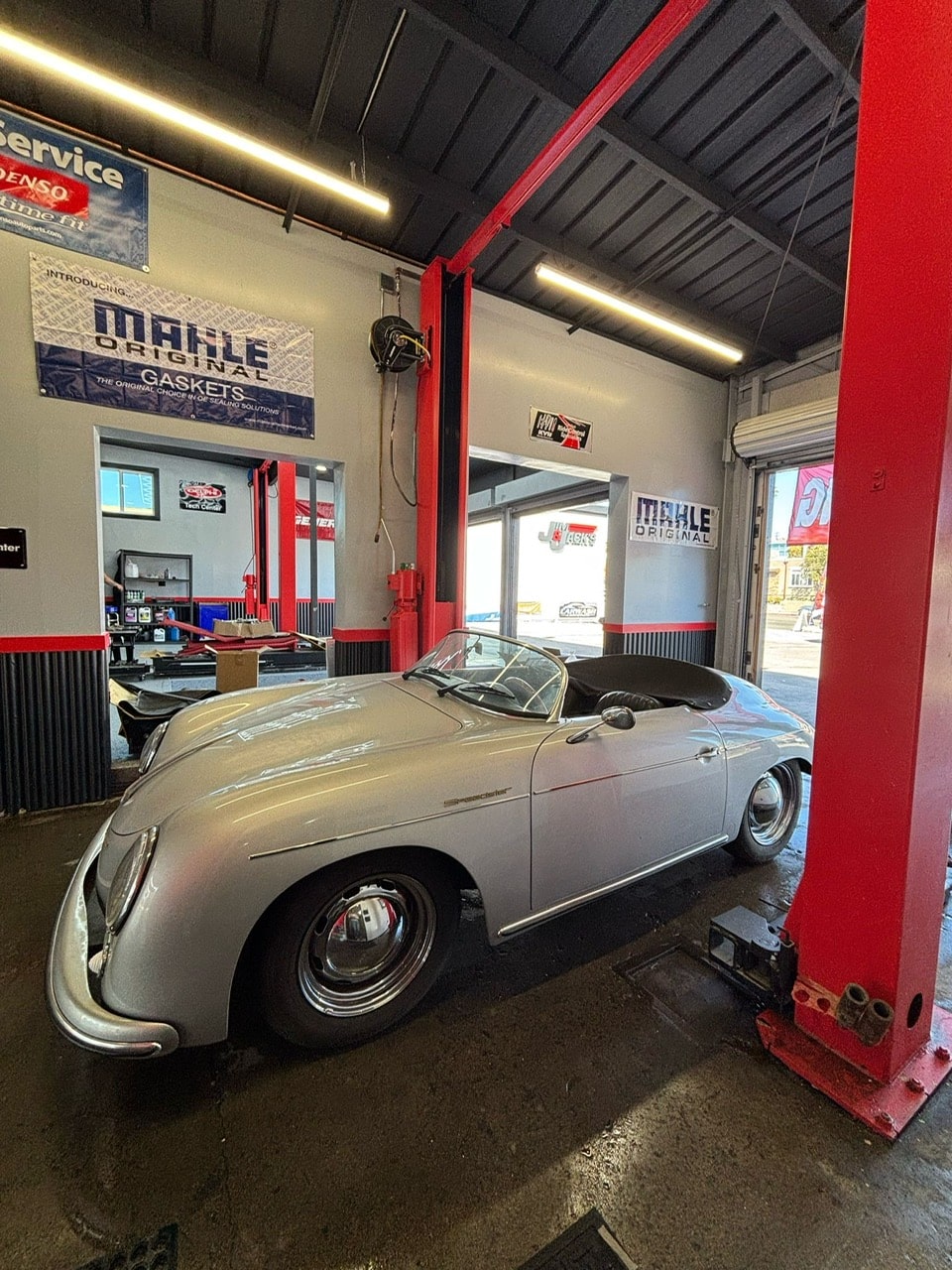 An antique car at Pitt Stop Auto awaiting vehicle repairs